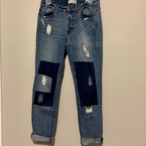 Patched ripped jeans